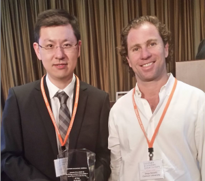 Ji Yan, left, with Eastern Economic Journal Associate Editor Diego Nocetti